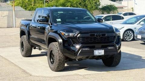Black 2026 Toyota Tacoma Hybrid TRD Off Road