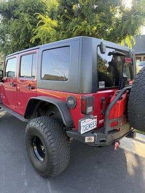 Red 2009 Jeep Wrangler Unlimited X