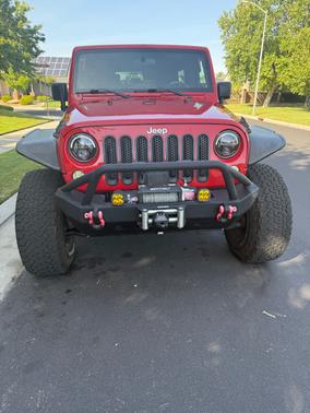 Red 2009 Jeep Wrangler Unlimited X