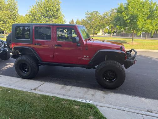 Red 2009 Jeep Wrangler Unlimited X