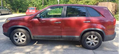 Red 2011 Kia Sorento LX