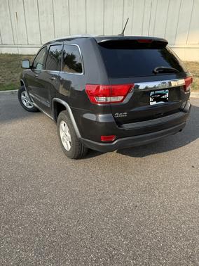 Black 2011 Jeep Grand Cherokee Laredo