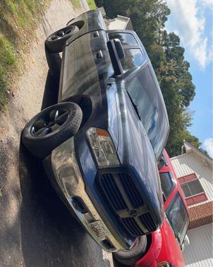 Photo 2 of 3 of 2014 RAM 1500 Big Horn