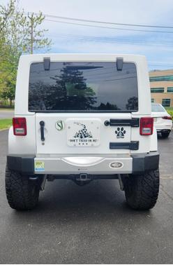 White 2014 Jeep Wrangler Unlimited Sahara