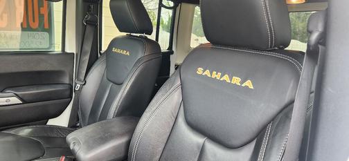 White 2014 Jeep Wrangler Unlimited Sahara