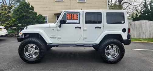 White 2014 Jeep Wrangler Unlimited Sahara