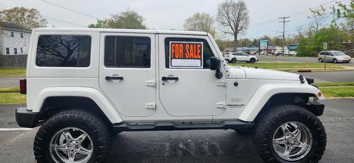 White 2014 Jeep Wrangler Unlimited Sahara