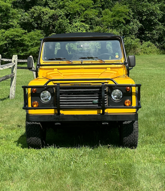 Yellow 1995 Land Rover Defender 90