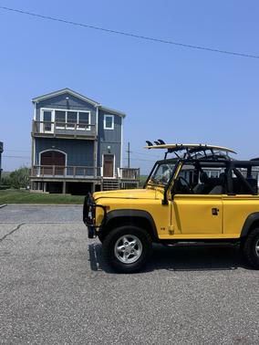 Yellow 1995 Land Rover Defender 90