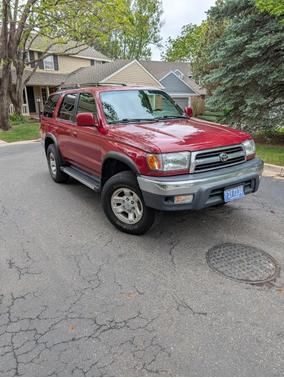 Red 1999 Toyota 4Runner SR5 4WD