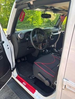 White 2014 Jeep Wrangler Unlimited Sahara