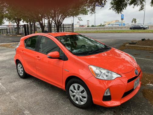 Orange 2012 Toyota Prius c Two