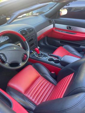 Red 2002 Ford Thunderbird Deluxe