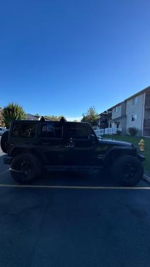 Black 2013 Jeep Wrangler Unlimited Sport
