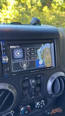 Black 2013 Jeep Wrangler Unlimited Sport