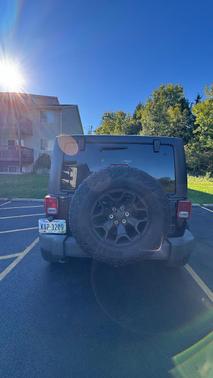 Black 2013 Jeep Wrangler Unlimited Sport