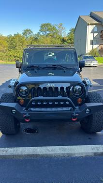 Black 2013 Jeep Wrangler Unlimited Sport