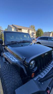 Black 2013 Jeep Wrangler Unlimited Sport