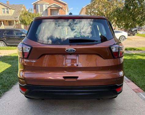 Orange 2017 Ford Escape S
