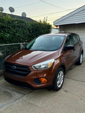 Orange 2017 Ford Escape S
