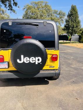 Yellow 2004 Jeep Wrangler SE