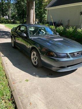 Green 1999 Ford Mustang GT