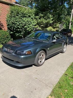 Green 1999 Ford Mustang GT