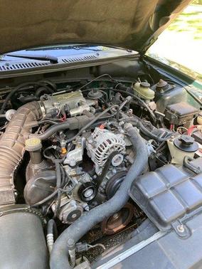 Green 1999 Ford Mustang GT