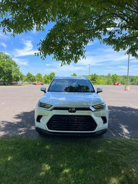 White 2025 Toyota Grand Highlander Hybrid XLE
