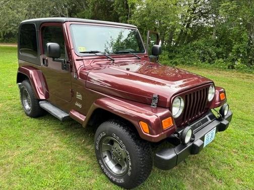 Red 2003 Jeep Wrangler Sahara