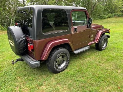 Red 2003 Jeep Wrangler Sahara