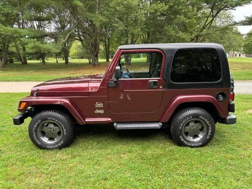 Red 2003 Jeep Wrangler Sahara