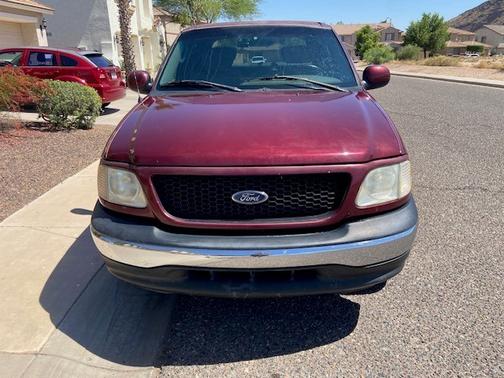 Red 2003 Ford F-150 XLT SuperCrew
