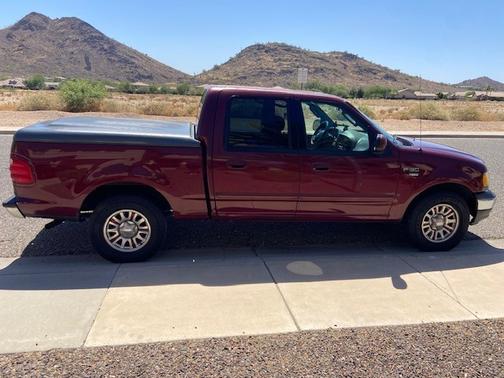 Red 2003 Ford F-150 XLT SuperCrew