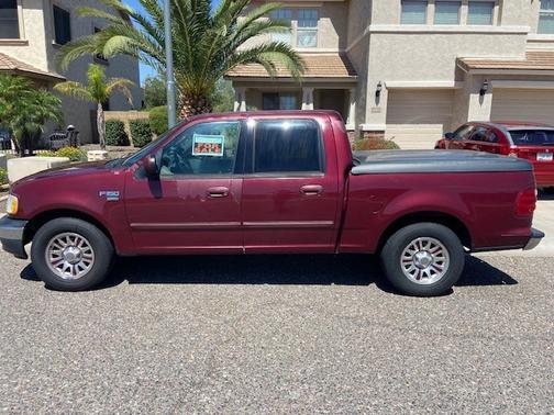 Red 2003 Ford F-150 XLT SuperCrew