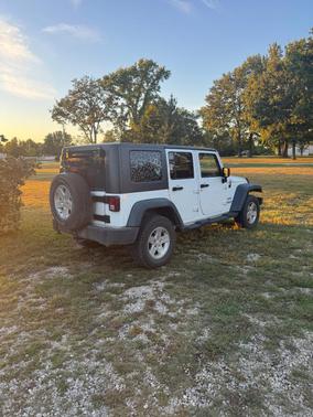 White 2010 Jeep Wrangler Unlimited Sport