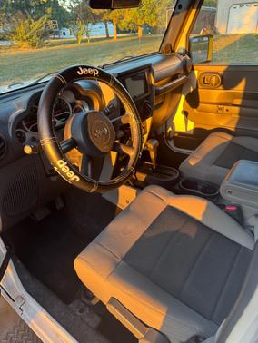 White 2010 Jeep Wrangler Unlimited Sport
