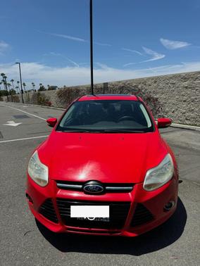 Red 2012 Ford Focus SEL