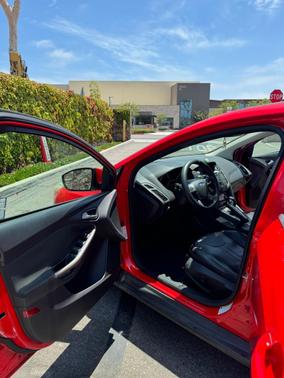 Red 2012 Ford Focus SEL