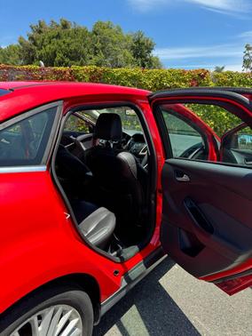 Red 2012 Ford Focus SEL