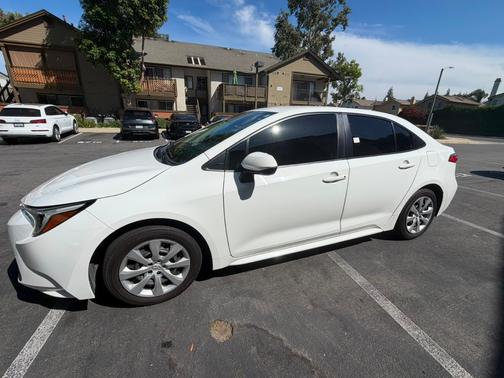 White 2023 Toyota Corolla Hybrid LE