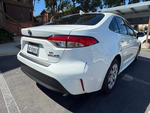 White 2023 Toyota Corolla Hybrid LE
