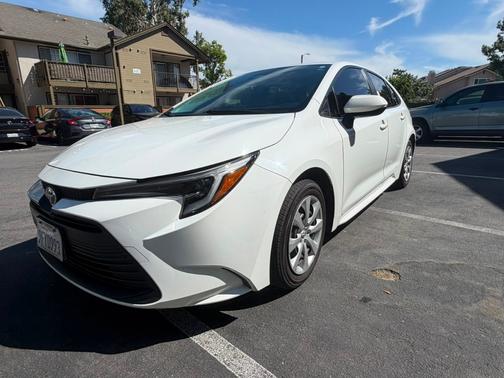 White 2023 Toyota Corolla Hybrid LE