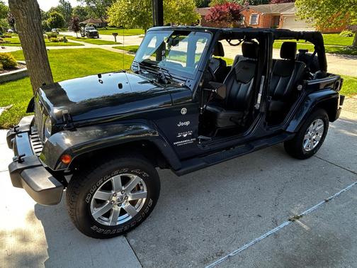 Blue 2017 Jeep Wrangler Unlimited Sahara