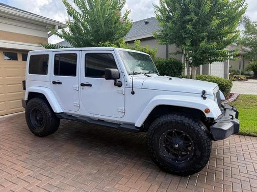 White 2012 Jeep Wrangler Unlimited Sahara