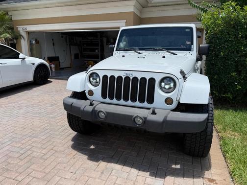 White 2012 Jeep Wrangler Unlimited Sahara