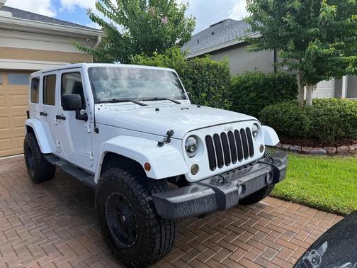 White 2012 Jeep Wrangler Unlimited Sahara