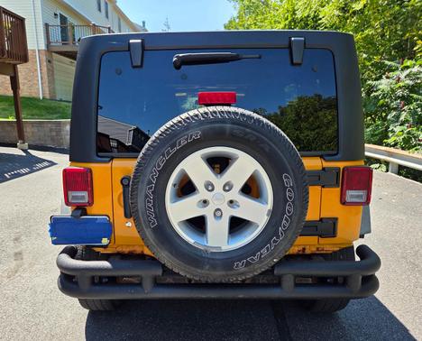 Yellow 2012 Jeep Wrangler Unlimited Sport