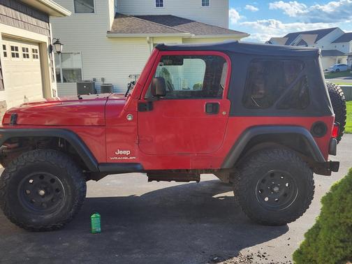 Red 2006 Jeep Wrangler X