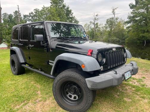 Black 2014 Jeep Wrangler Unlimited Sport